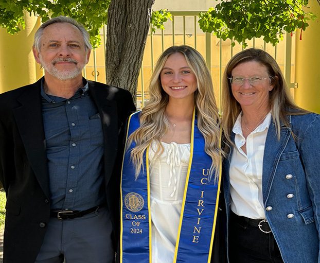 LAUREN with her Parents on university day.